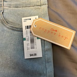Copper Key size Large. Light wash. Denim skirt mid length
